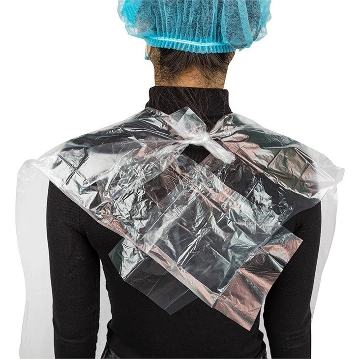 Disposable hair dressing capes (2)